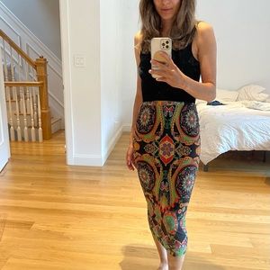 Beautiful knit pencil skirt. It runs small. You can wear it like a dress too.